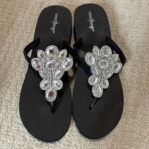 Worn once. Black bing flip flops.